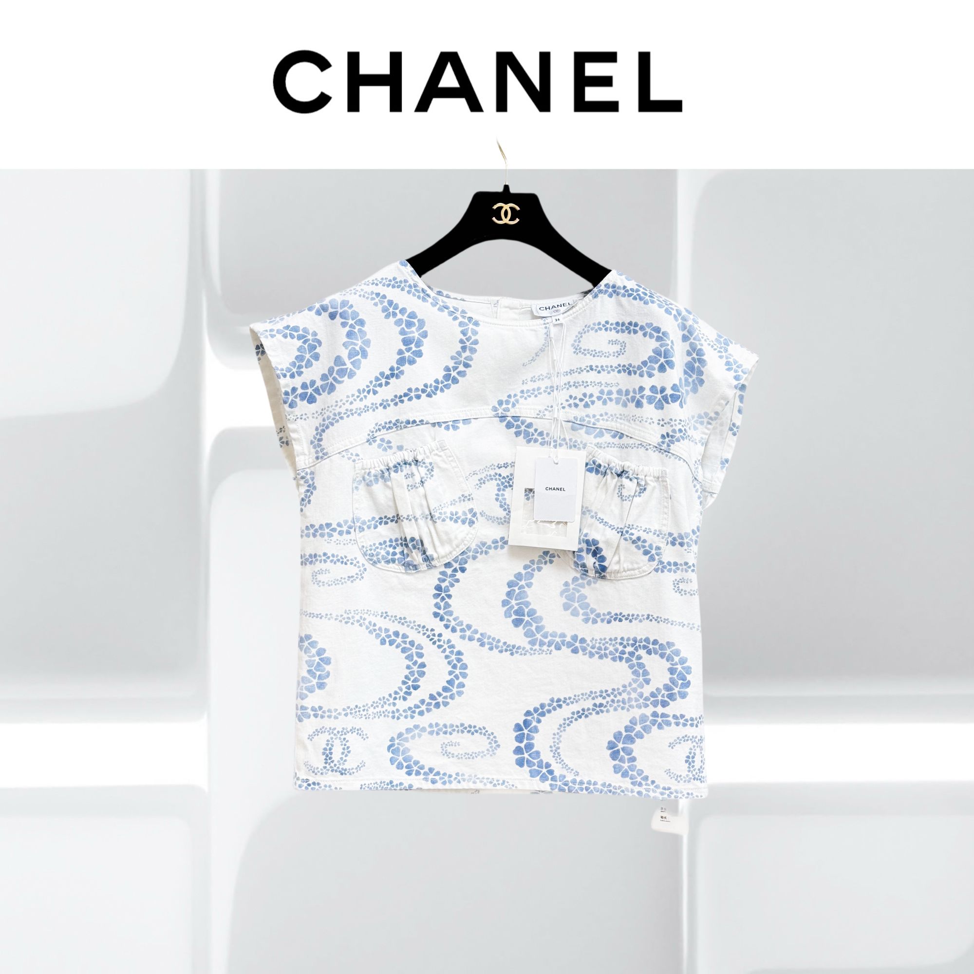 99新 Chanel/香奈儿 34码25M白色底蓝色花朵印花图案飞袖上衣 