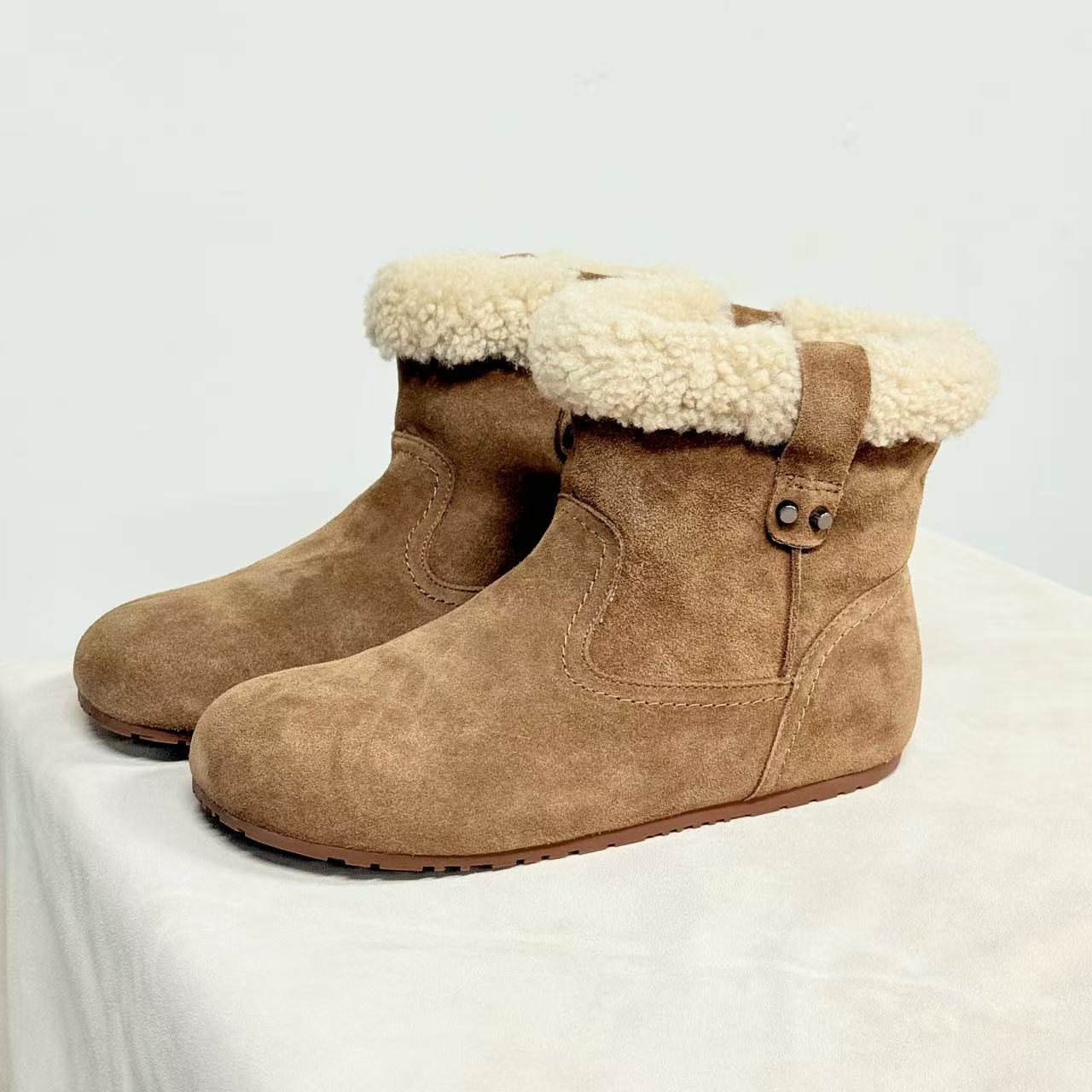 冬季保暖平跟羊毛真皮时尚雪地靴羊皮毛一体百搭短筒靴子DN6628-1