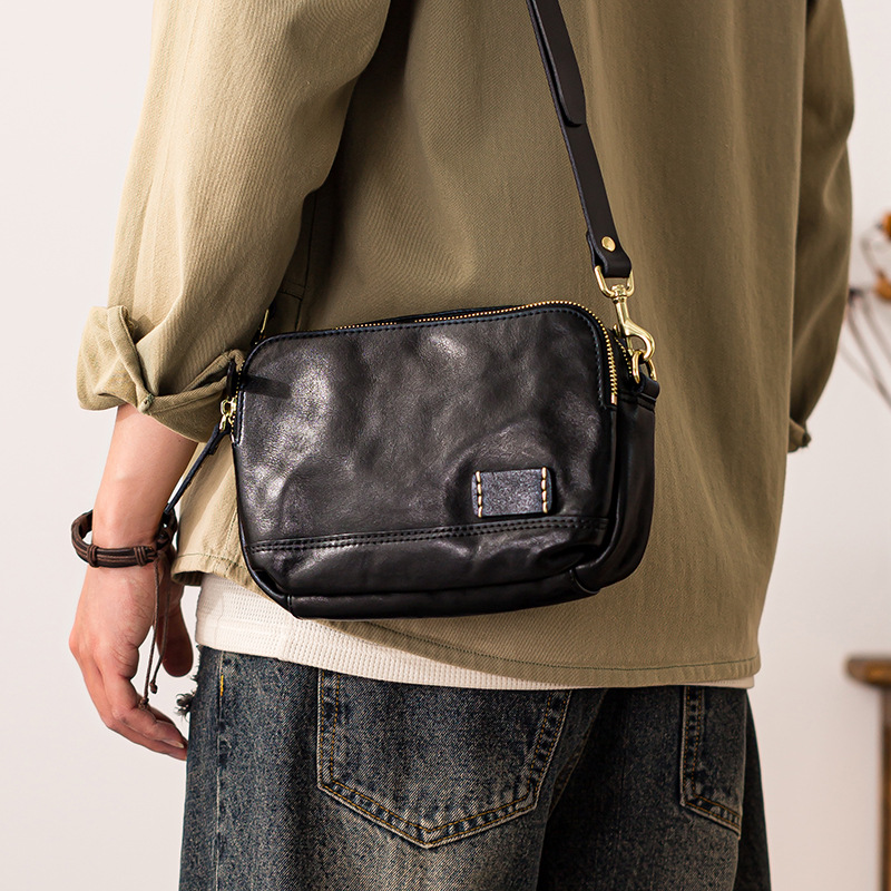 CJW/草匠王真皮男士单肩斜挎包男设计感小众植鞣牛皮休闲个性背包