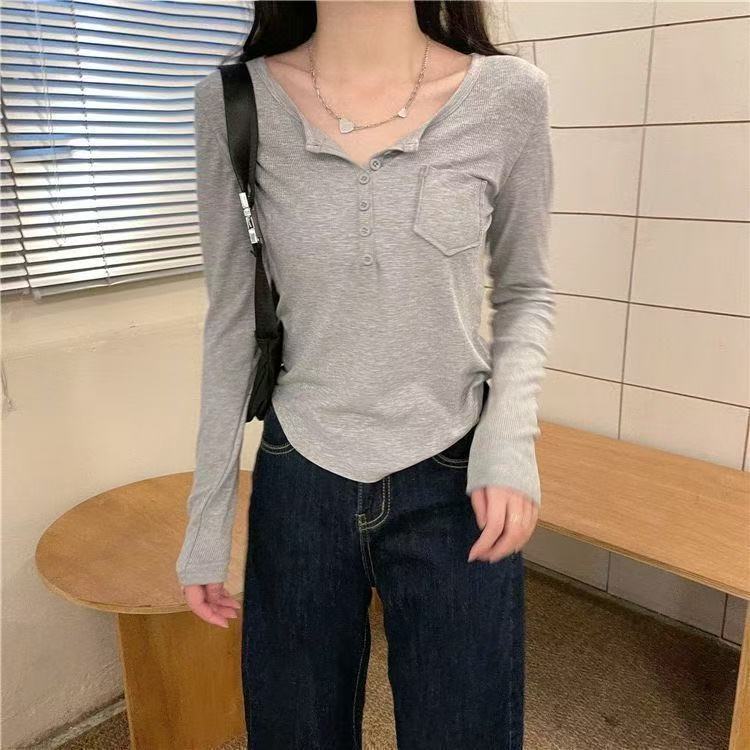 辣妹长袖打底衫女春秋设计感纽扣修身显瘦不规则纯欲百搭上衣 