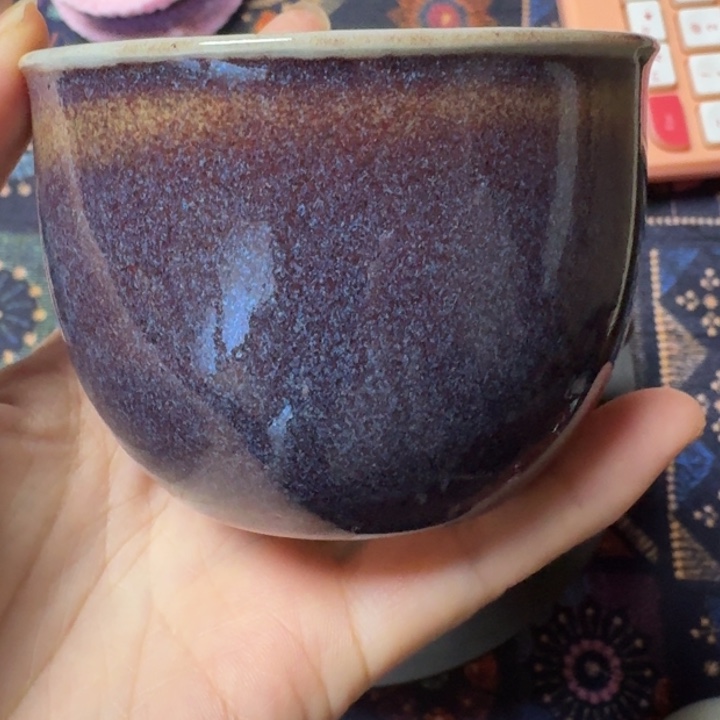 熠羽毛球的钧瓷杯