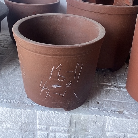 红陶中国宜兴紫砂花，