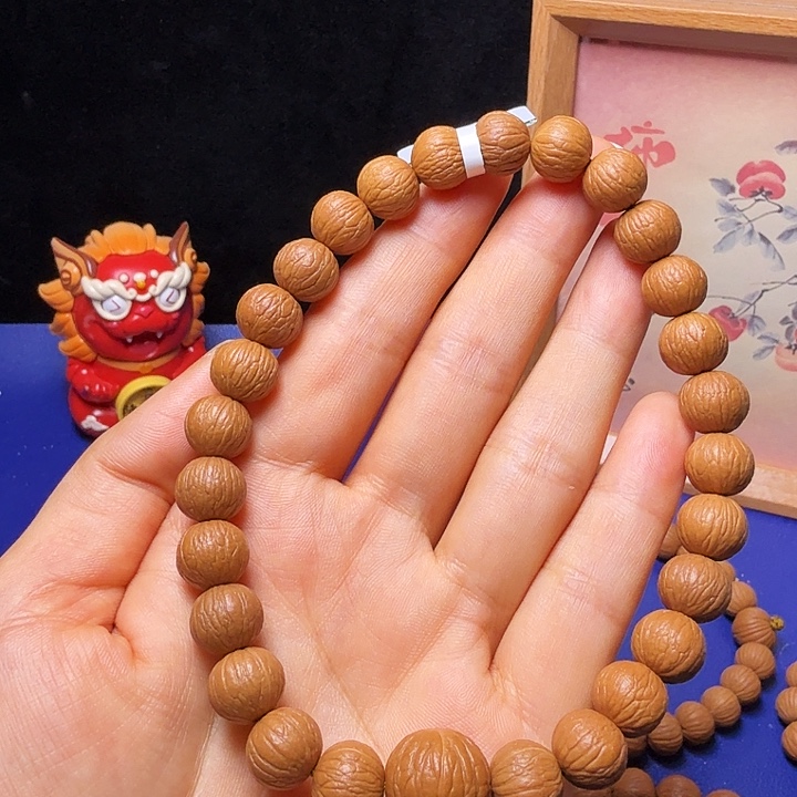 毒***猴头核桃吊坠凤羽