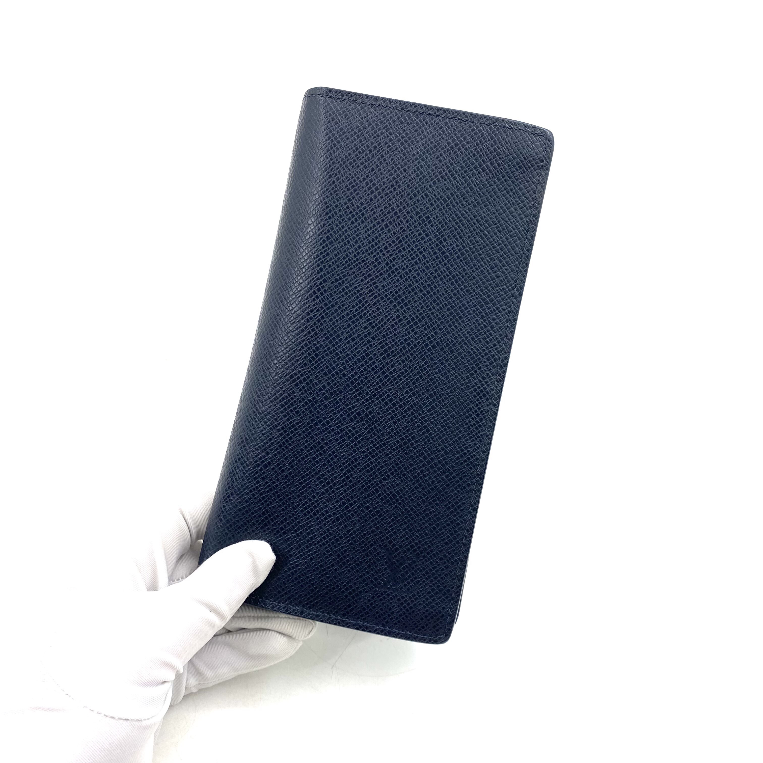 95新 LouisVuitton/路易威登  藏青色全皮对折钱包 有刻字19/10