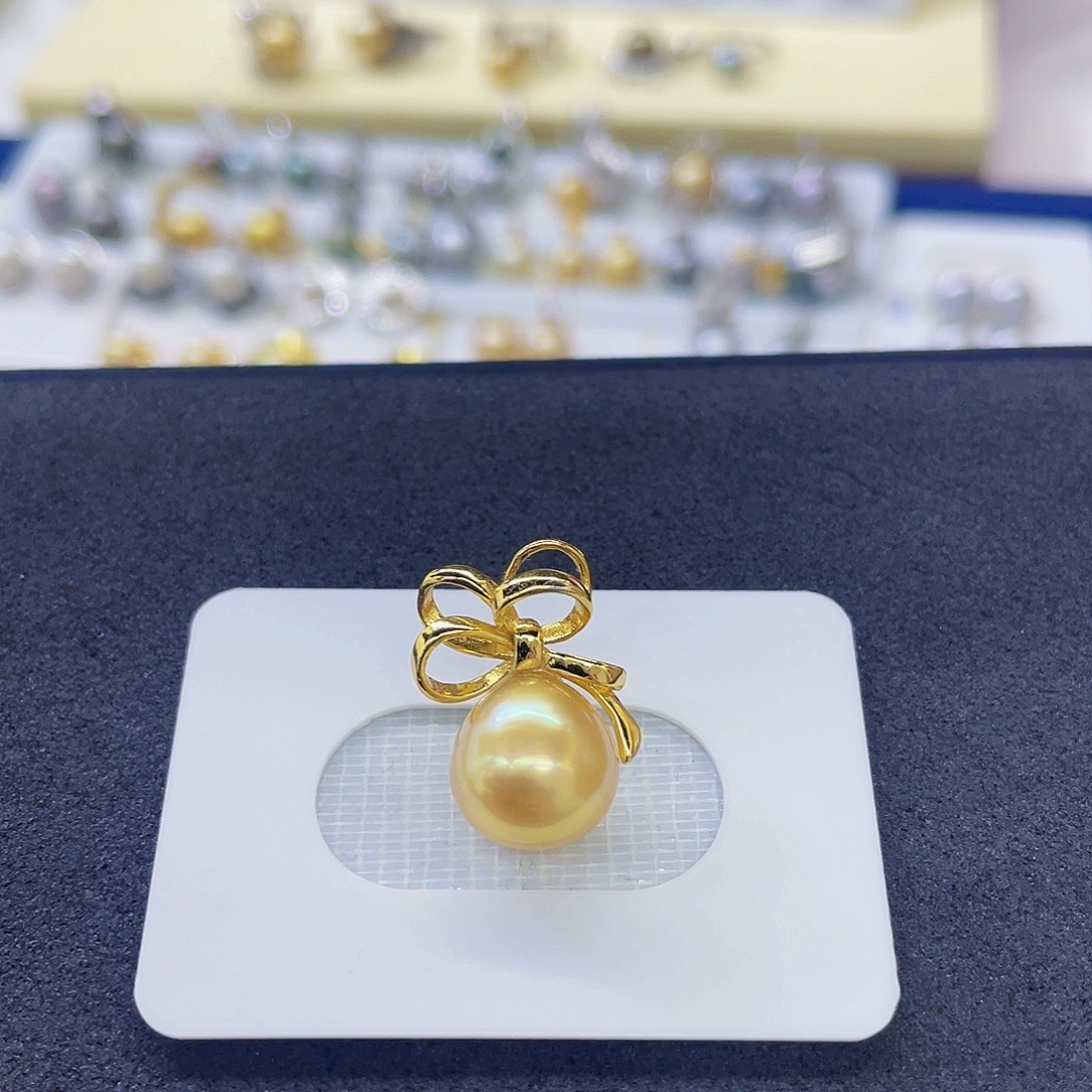 银S925镶嵌海水珍珠颈饰金珠蝴蝶结吊坠