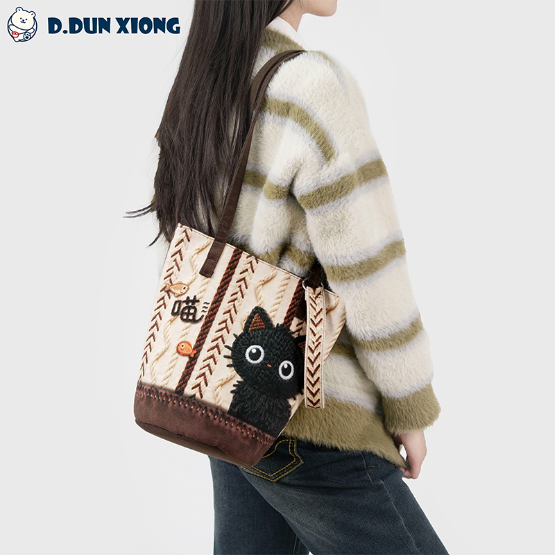 盾盾熊原创包包女款爆款2025新款水桶包休闲女包斜挎包便携手提包