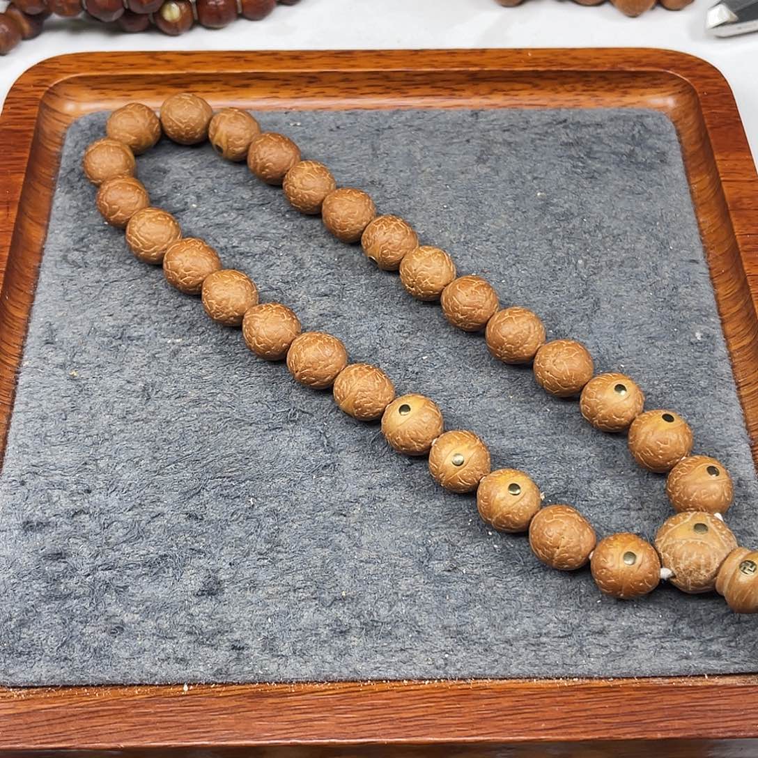 凤眼菩提手串W398-k50凤眼菩提小12+同树红油皮镶嵌