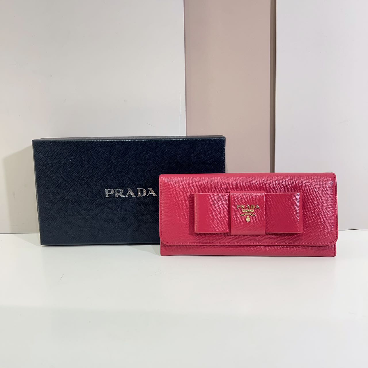 95新 Prada/普拉达 普拉达蝴蝶结长款翻盖钱包cj6155