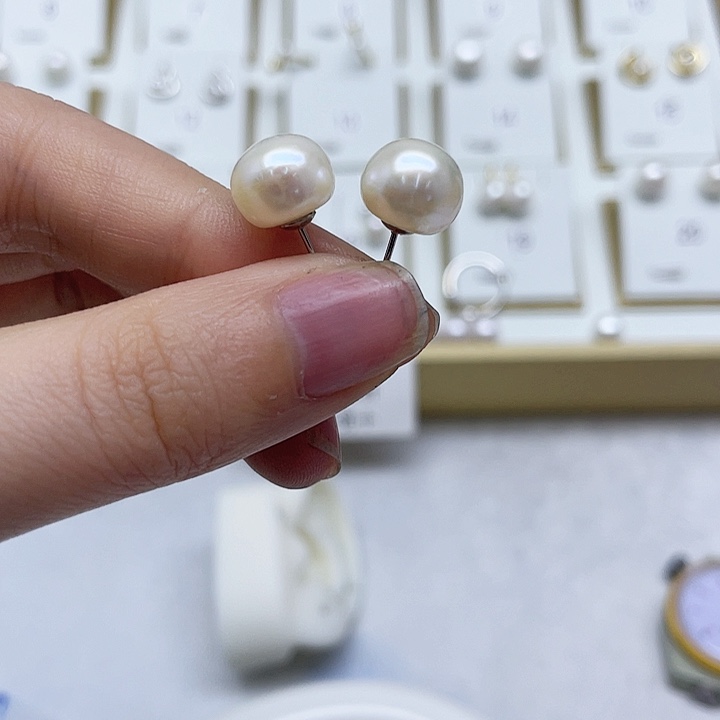 淡水珍珠耳饰银S925镶嵌向*花