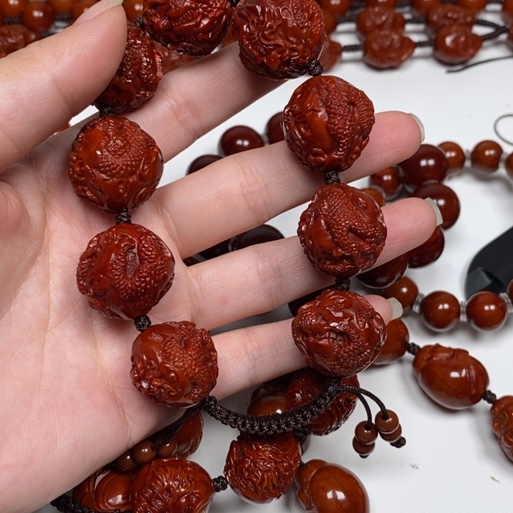 赵***令橄榄核雕刻工艺的发展