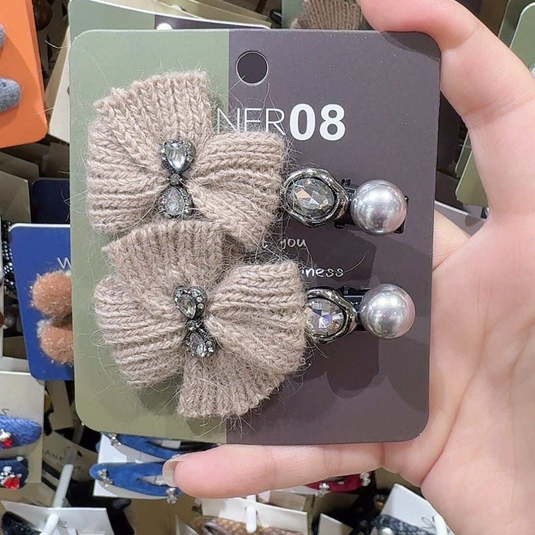 非金属浅咖蝴蝶结鸭夹