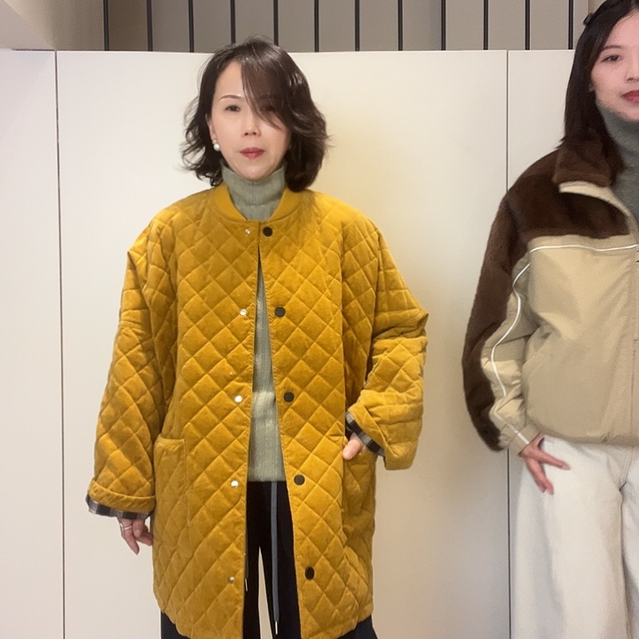 花瓣雨黄色鹅绒服