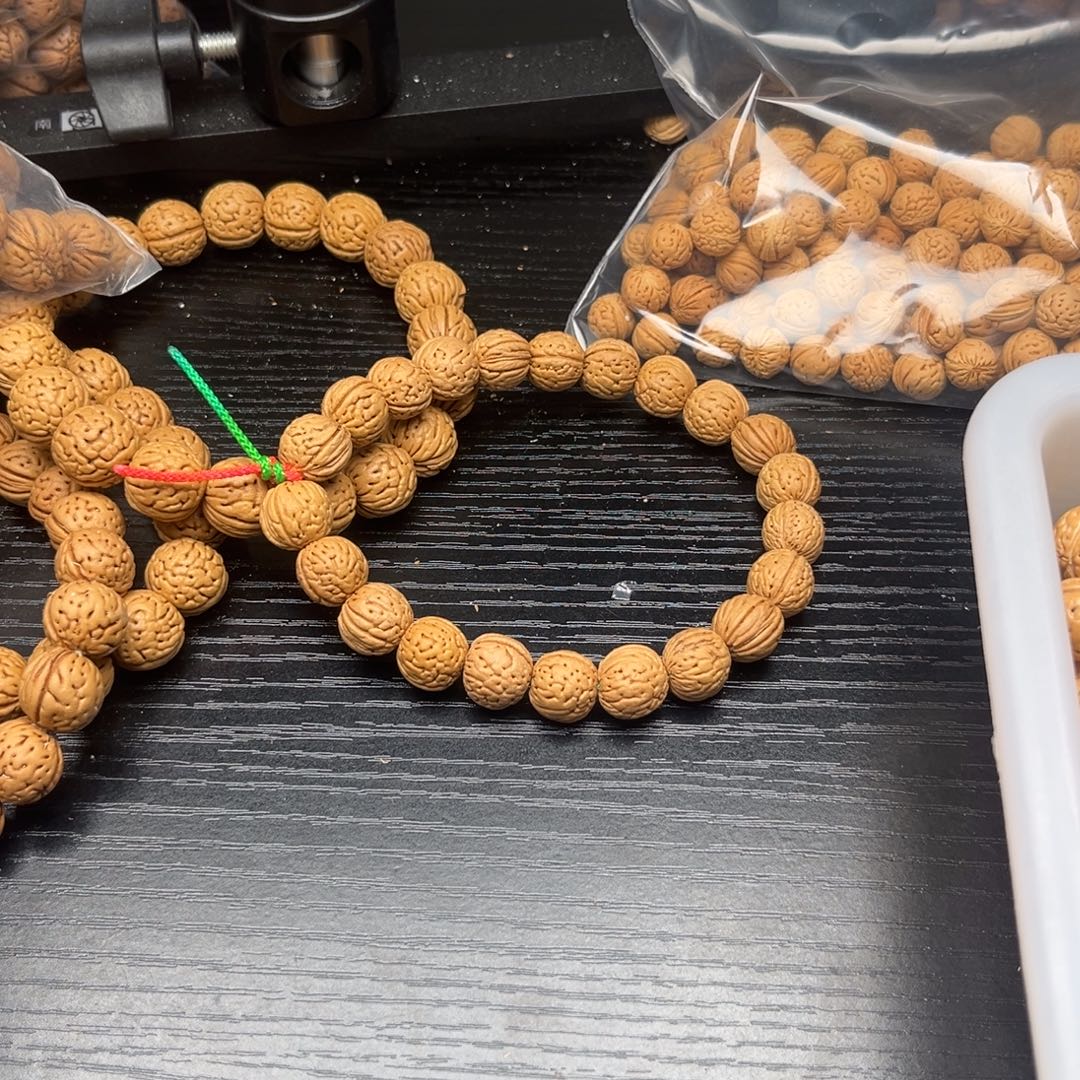 我***半文玩核桃吊坠小桃核散籽批发