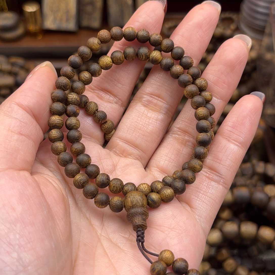 沉香碎屑奇楠0.5圆珠双圈5克