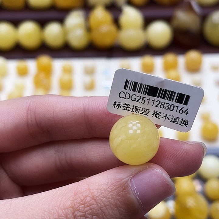 琥珀未镶嵌裸石14.2mm瑕