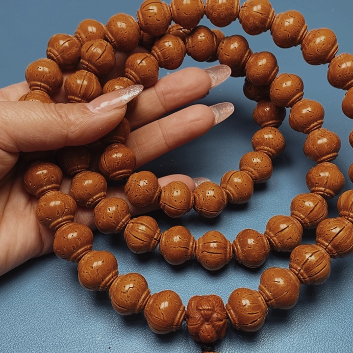 桃核脖挂灯笼17花皮色差60颗