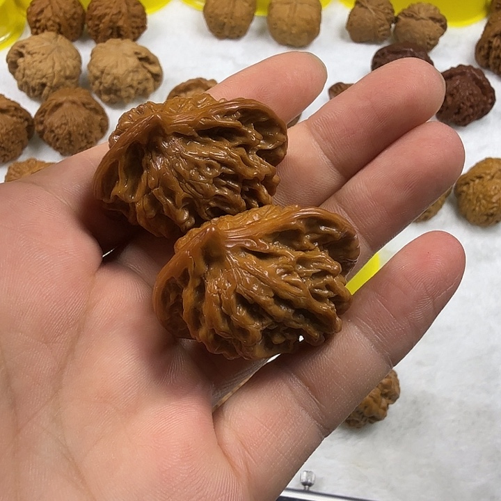 刘***升桃核吊坠小鸟文玩核桃