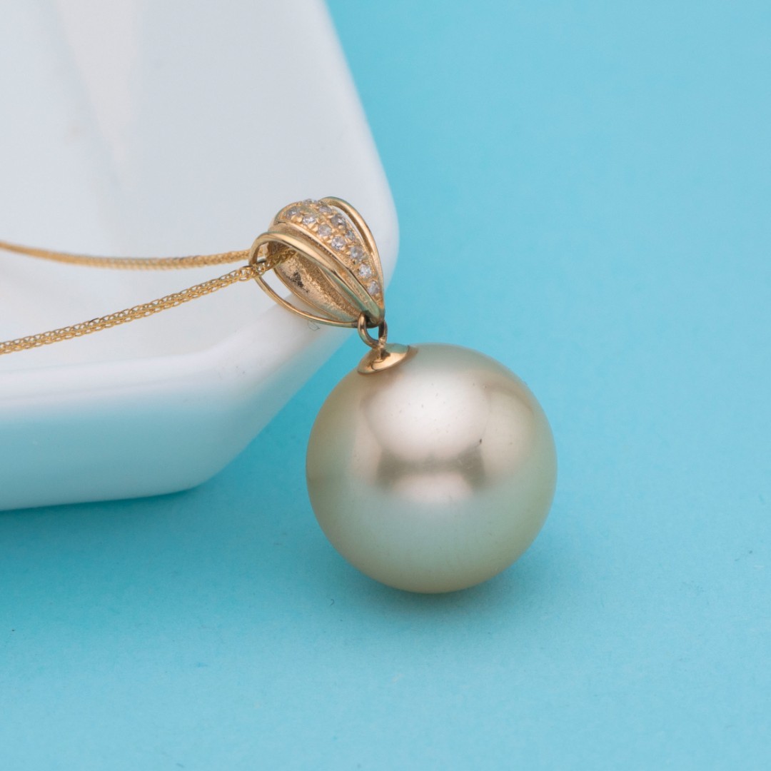 芈伽勒18K钻石海水金珠瓜子扣送肖邦金链C649