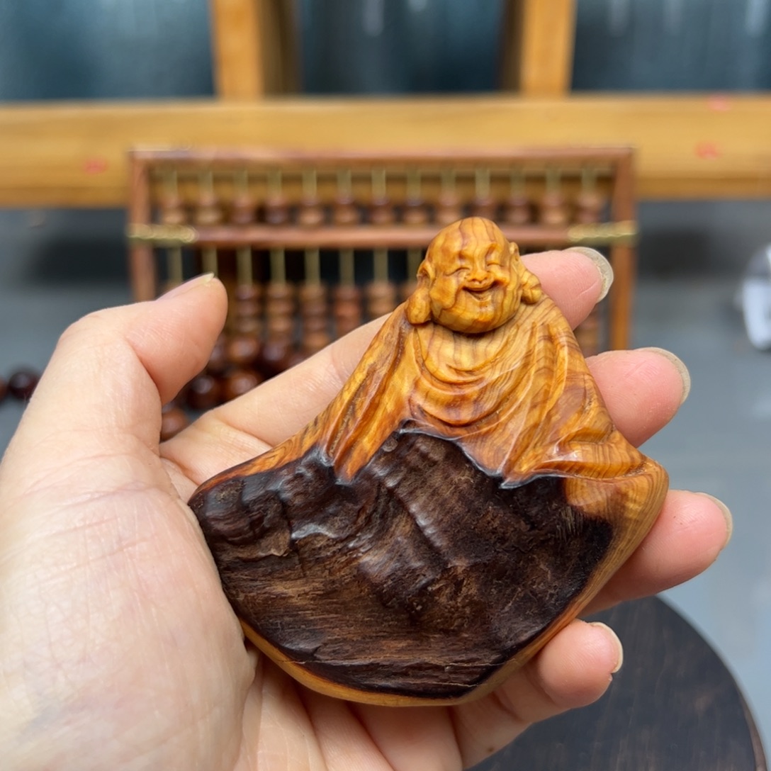 贝***y柏木崖柏木摆件手把件，