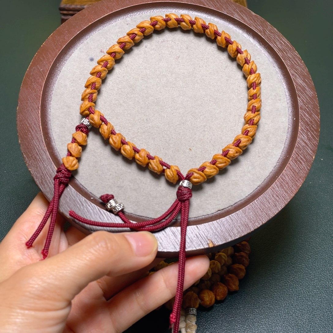 柏香籽/百香籽吊坠蛇骨配饰手持