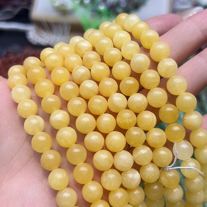 玛瑙/玉髓未镶嵌珠宝半成品黄玉圆珠一条