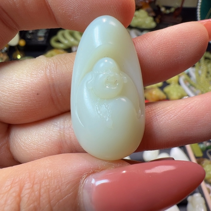 和田玉（白玉）颈饰未镶嵌11.1克。米达吊坠