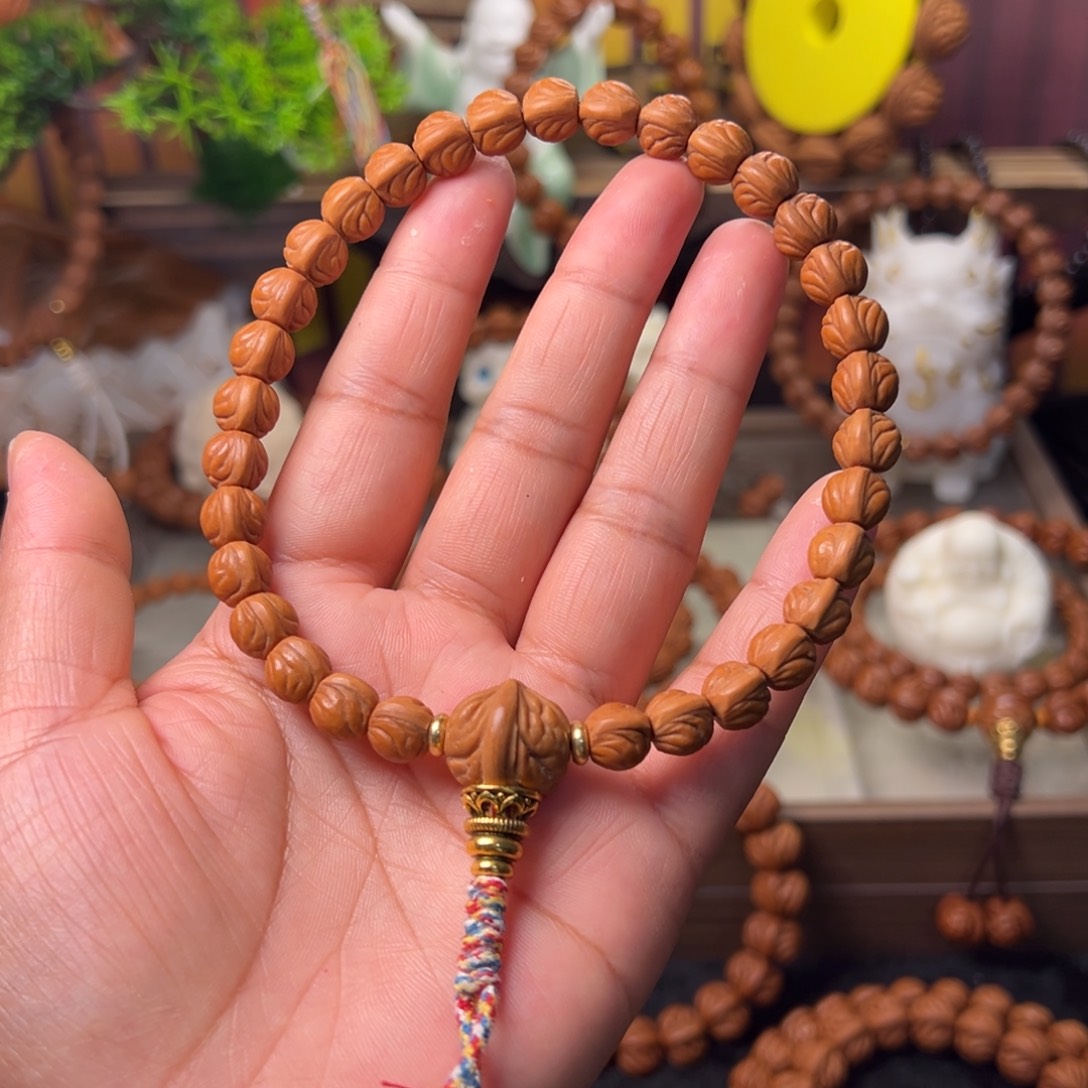 一***光桃核吊坠金玉龙手持09