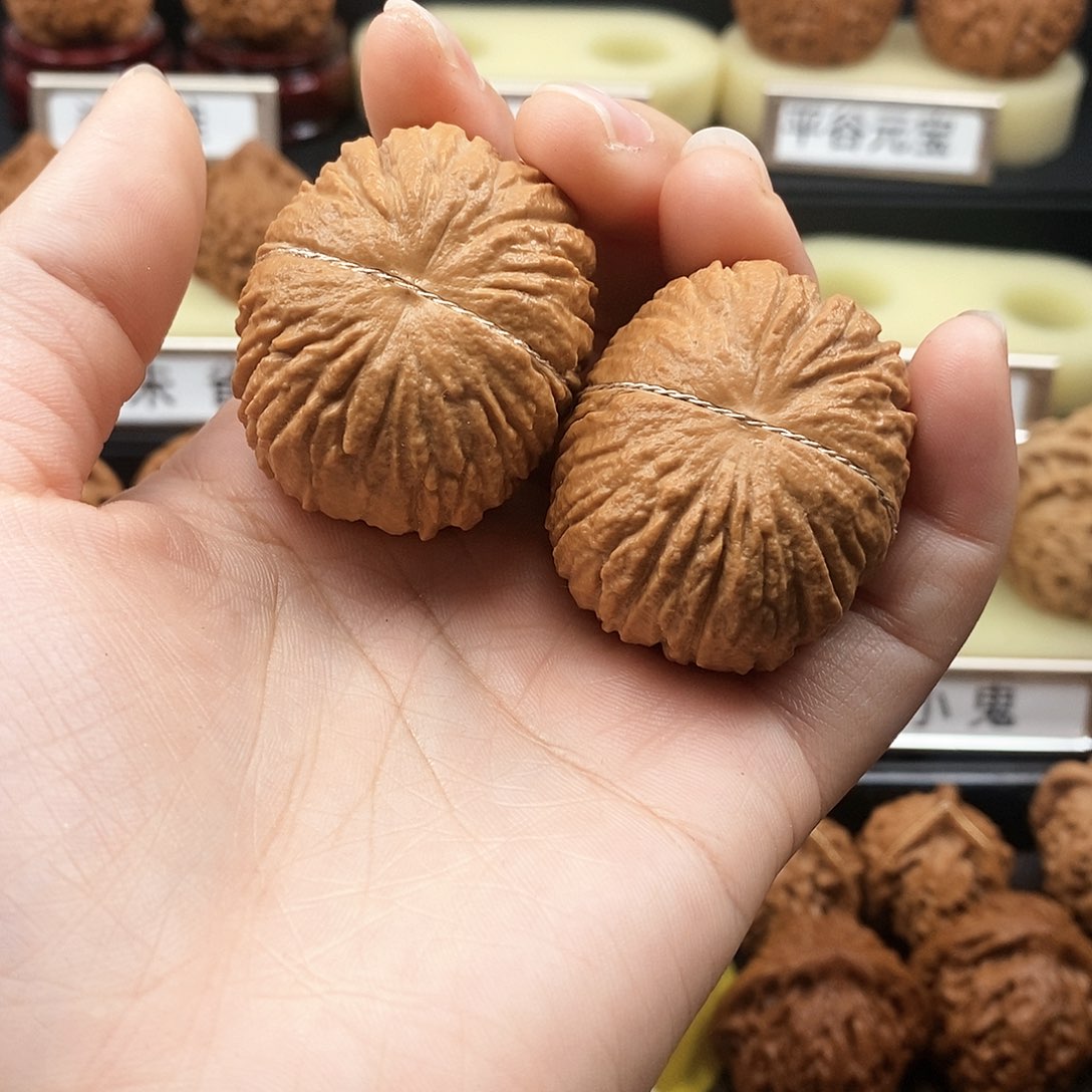 文玩核桃把件法****司猴头元宝1919