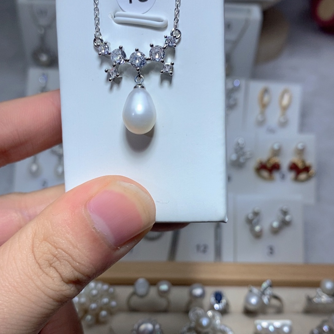 淡水珍珠银S925镶嵌耳饰