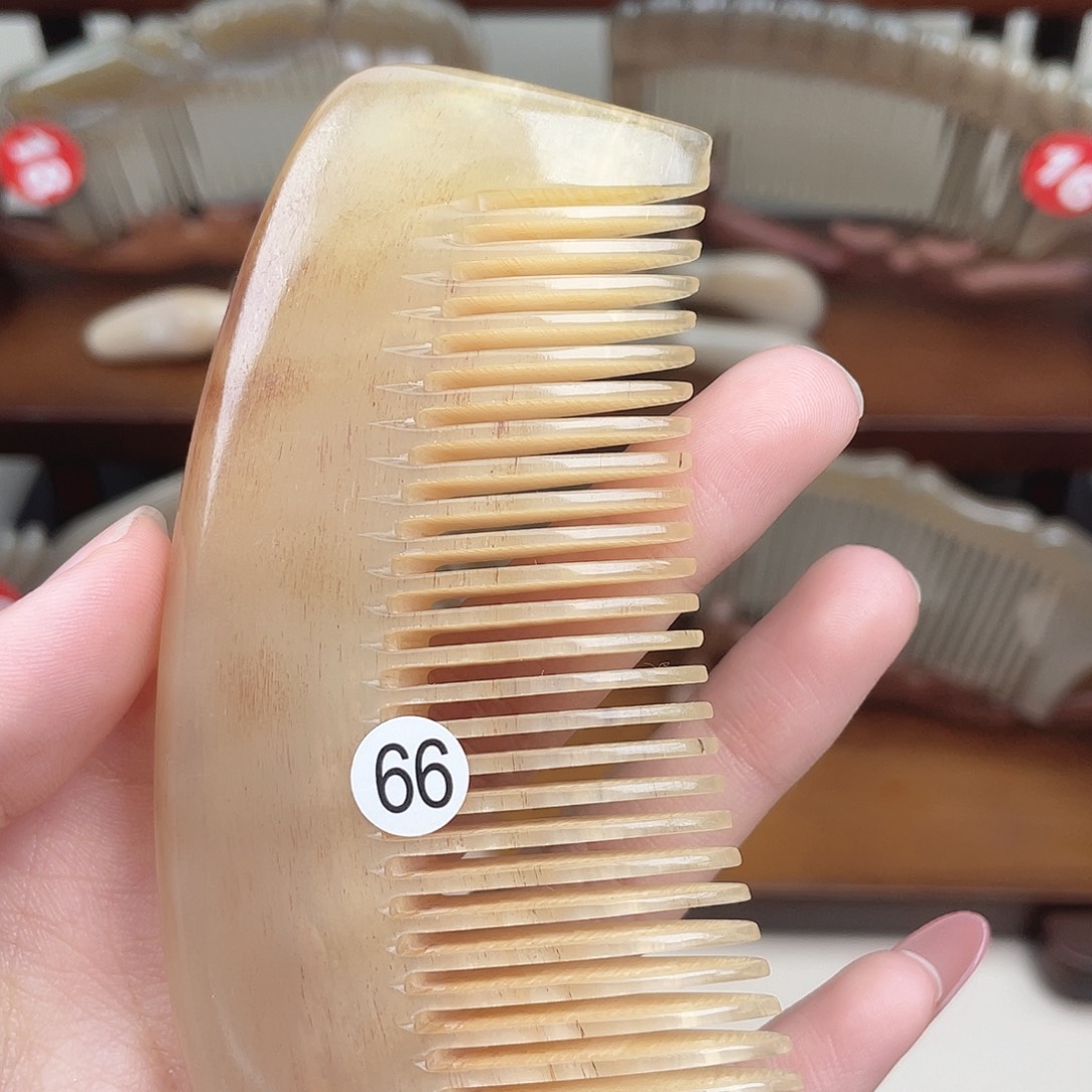 纯手工制作的牛角梳66小**?