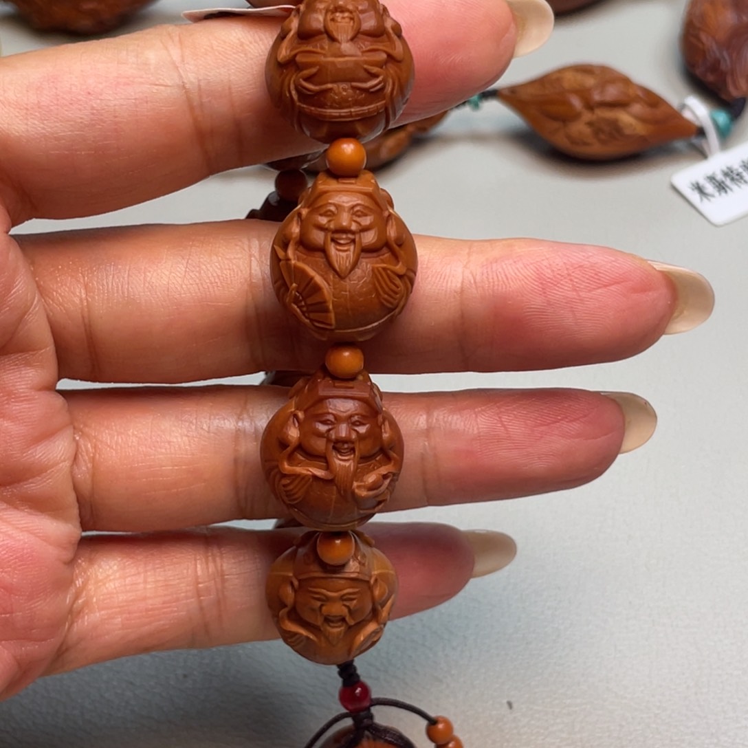 橄榄核吊坠财源滚滚