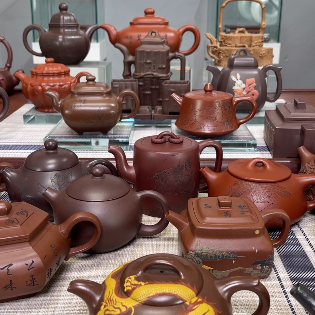 强***菜紫砂茶壶步步高升牛图案