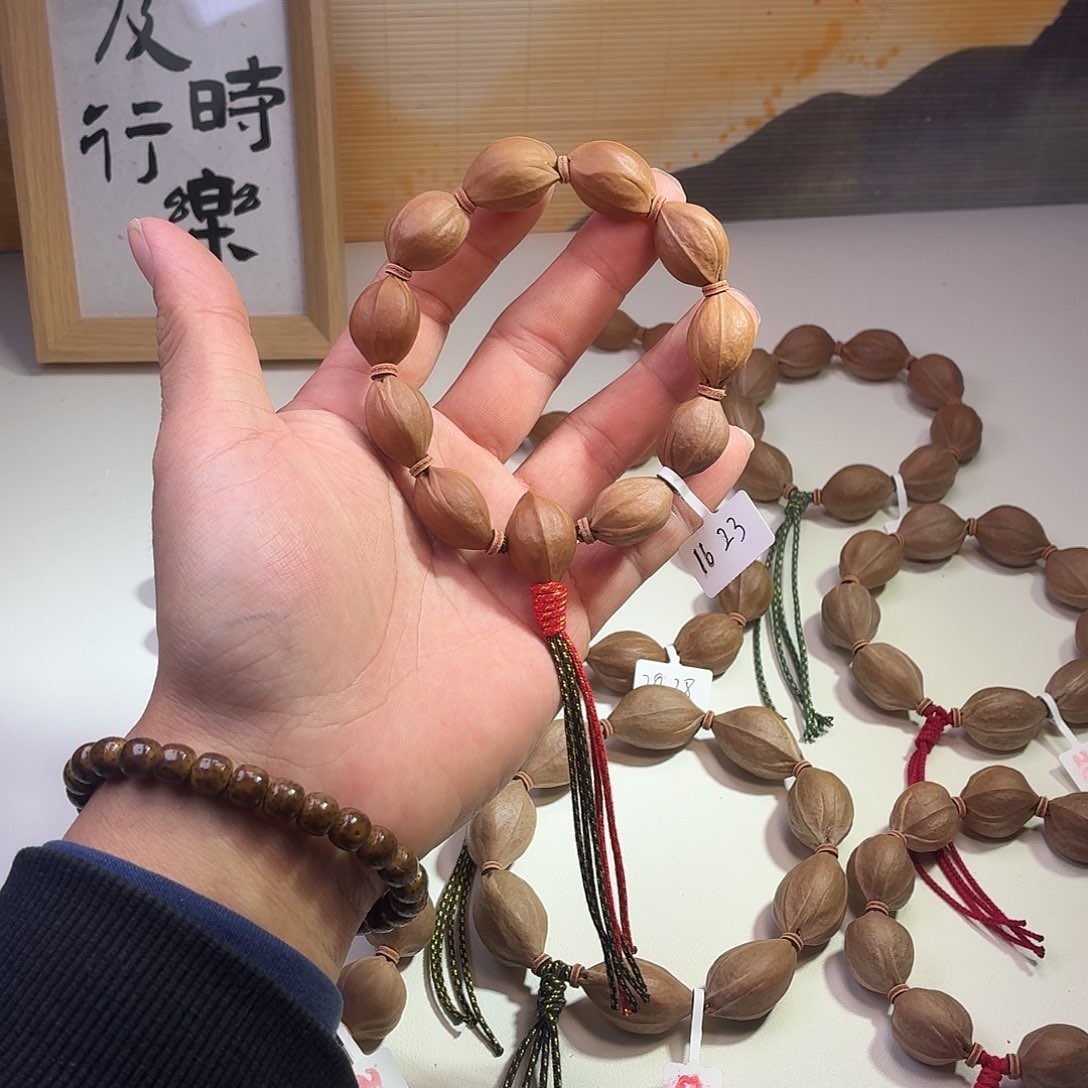 扬***吊坠橄榄核梅林铁核16.23