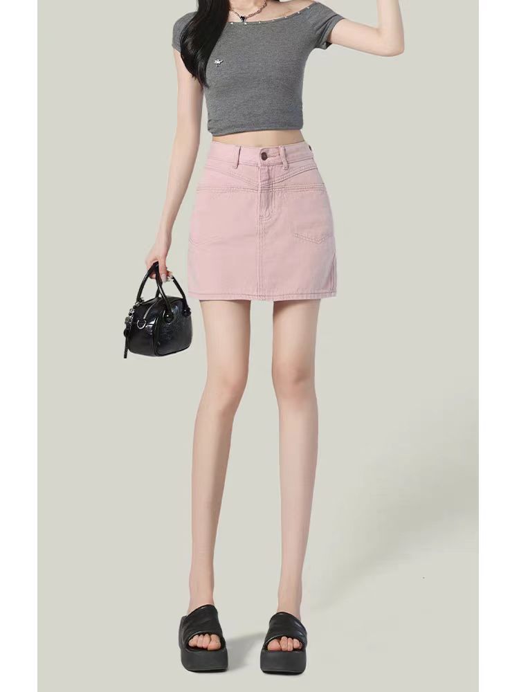 粉色牛仔短裙女夏季2025新款防走光百搭高腰A字包臀半身裙子