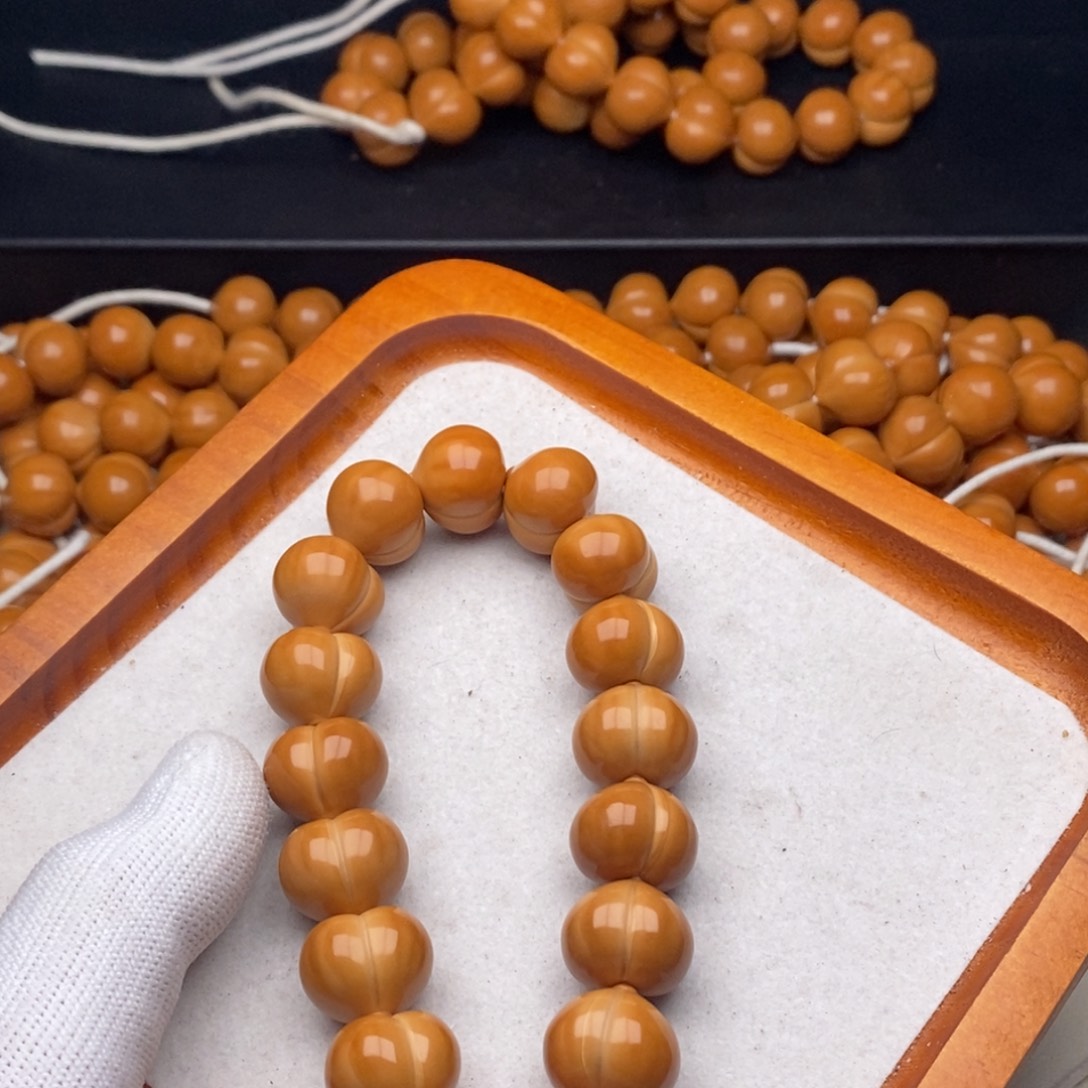 榴***儿吊坠猴头核桃聚宝盆屁桃