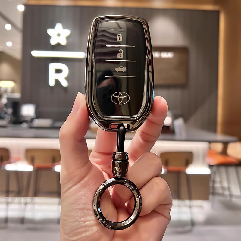 适用丰田24款凯美瑞钥匙套汉兰达荣放RAV4卡罗拉雷凌亚洲龙壳包扣