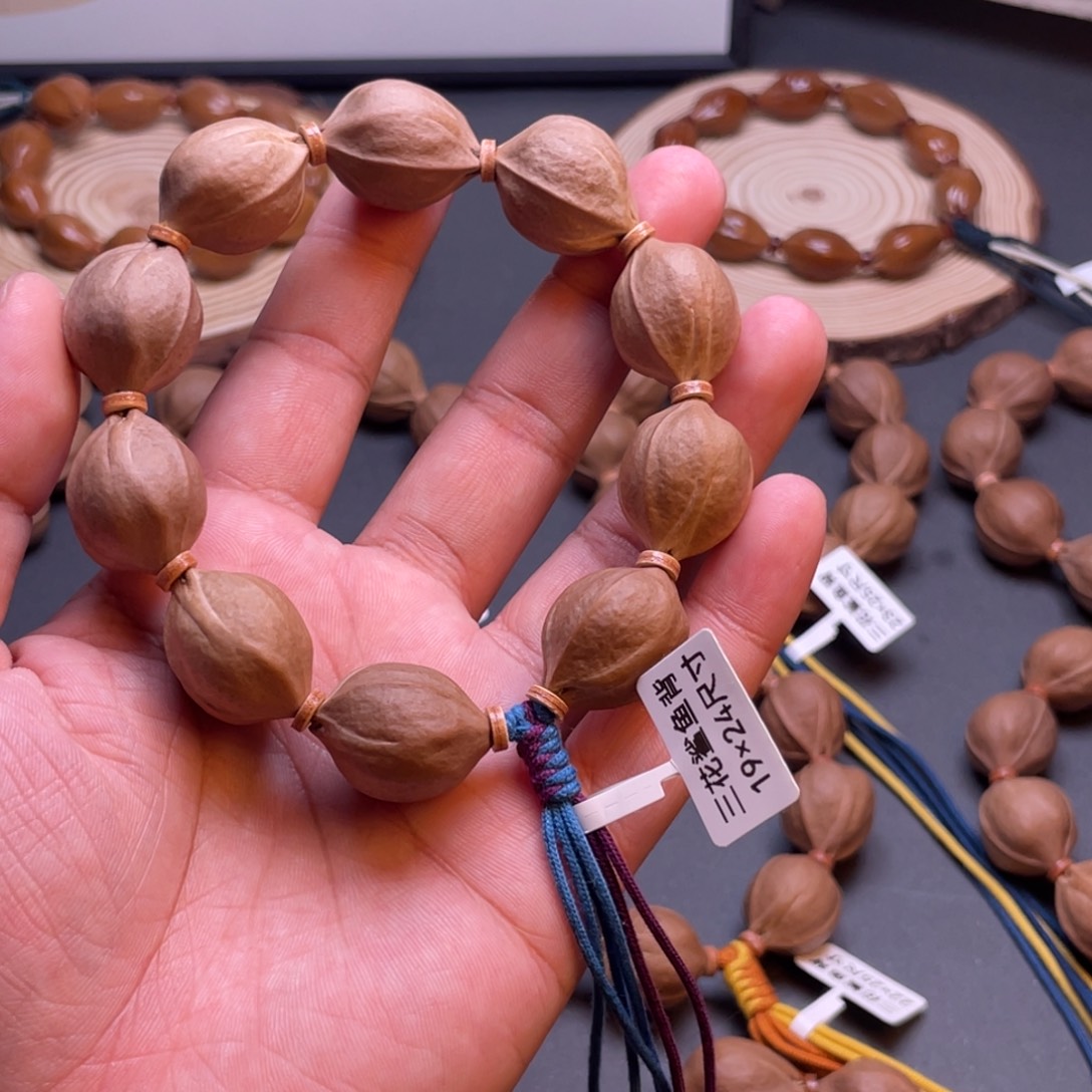 兜***兜橄榄核手串梅林铁核三花鲨鱼背原皮素串19×24尺寸加三通
