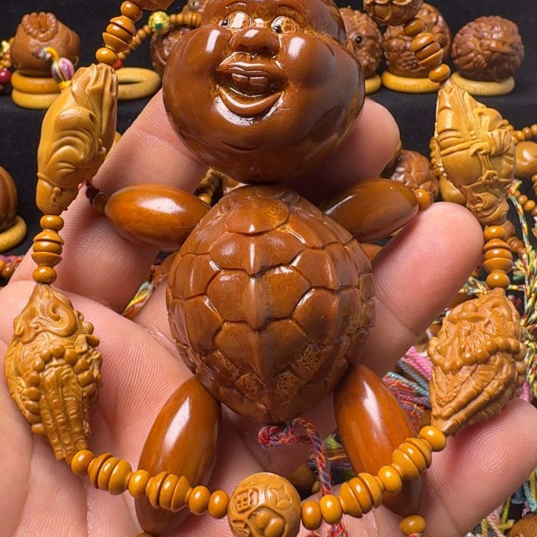 倔***鈏橄榄核把件大富贵