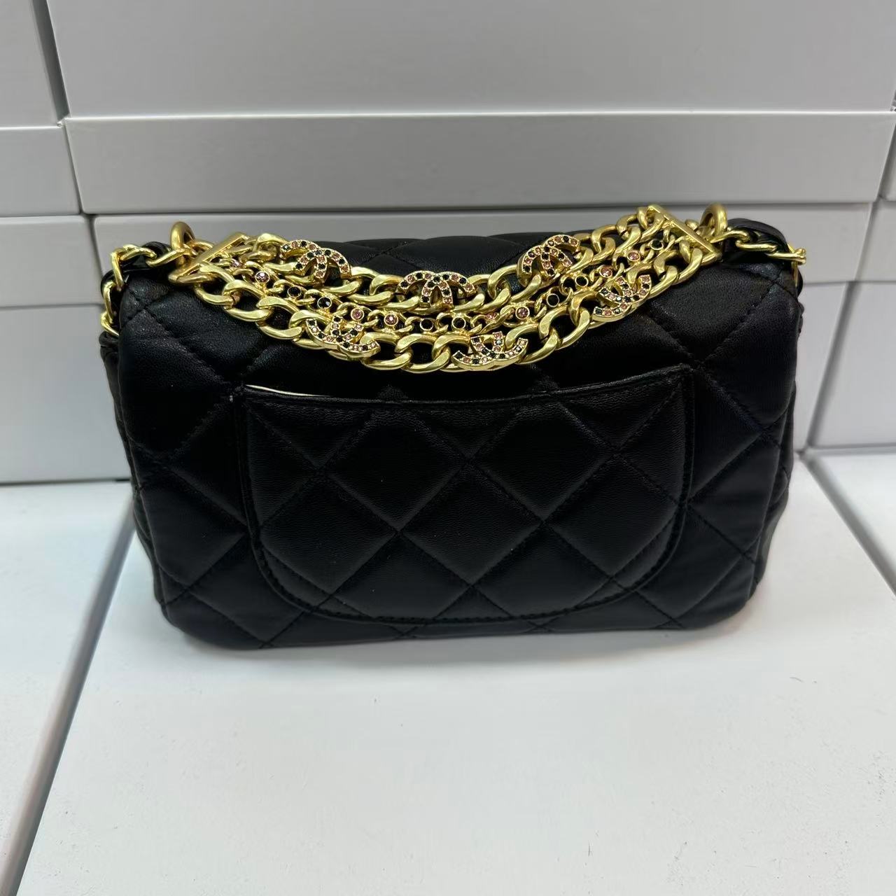 耐磨单根搭扣卡位通勤风单肩包单肩百搭女士经典金球