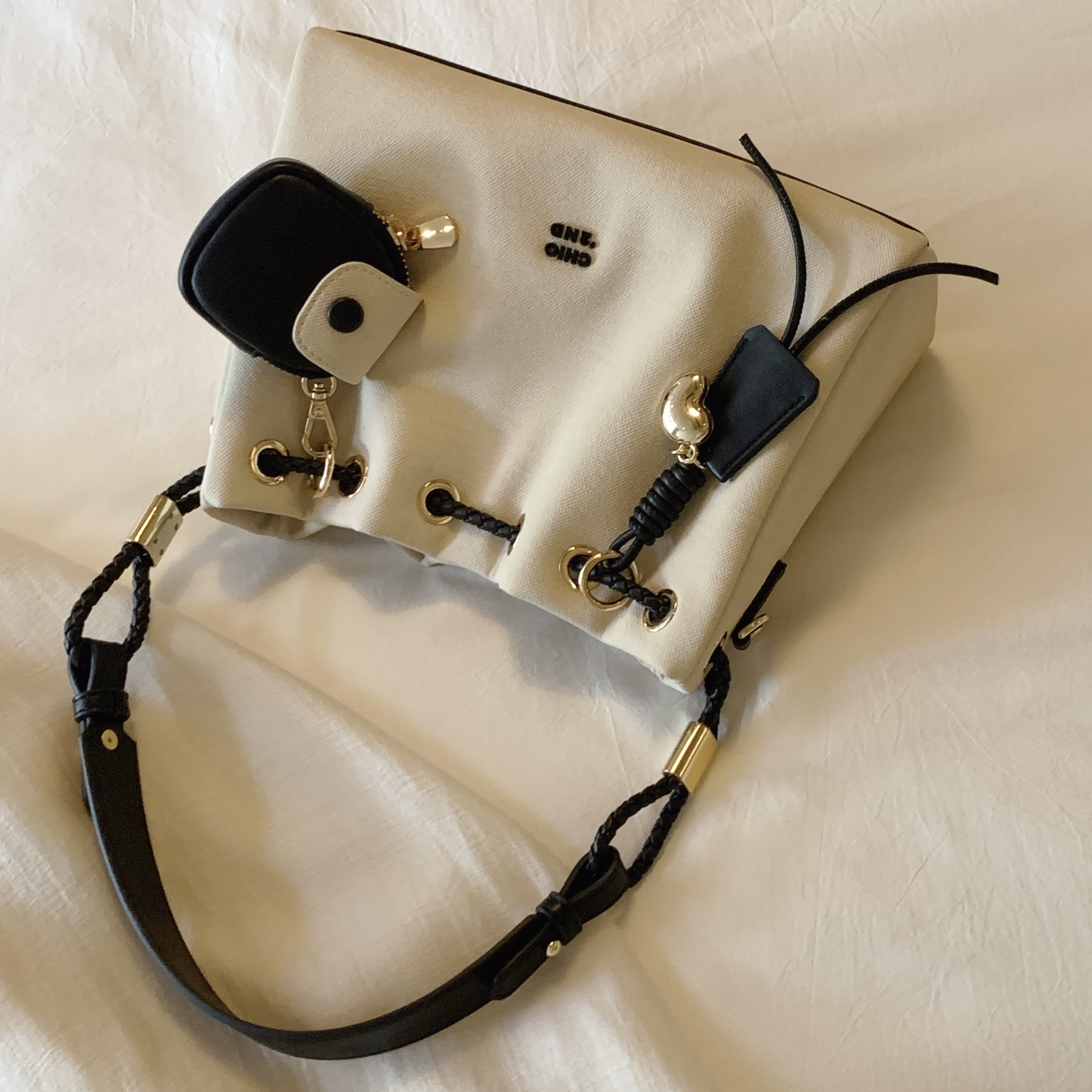 南风Chio2nd托特包包女2025新款超火通勤抽绳单肩斜挎