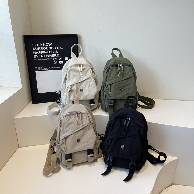 2025夏季新款日系潮流百搭双肩包轻便休闲旅行背包简约胸包单肩包