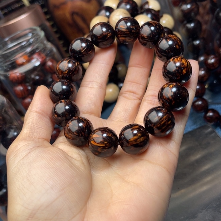 安***、端景台花梨木类海南红降1.6黑金手串