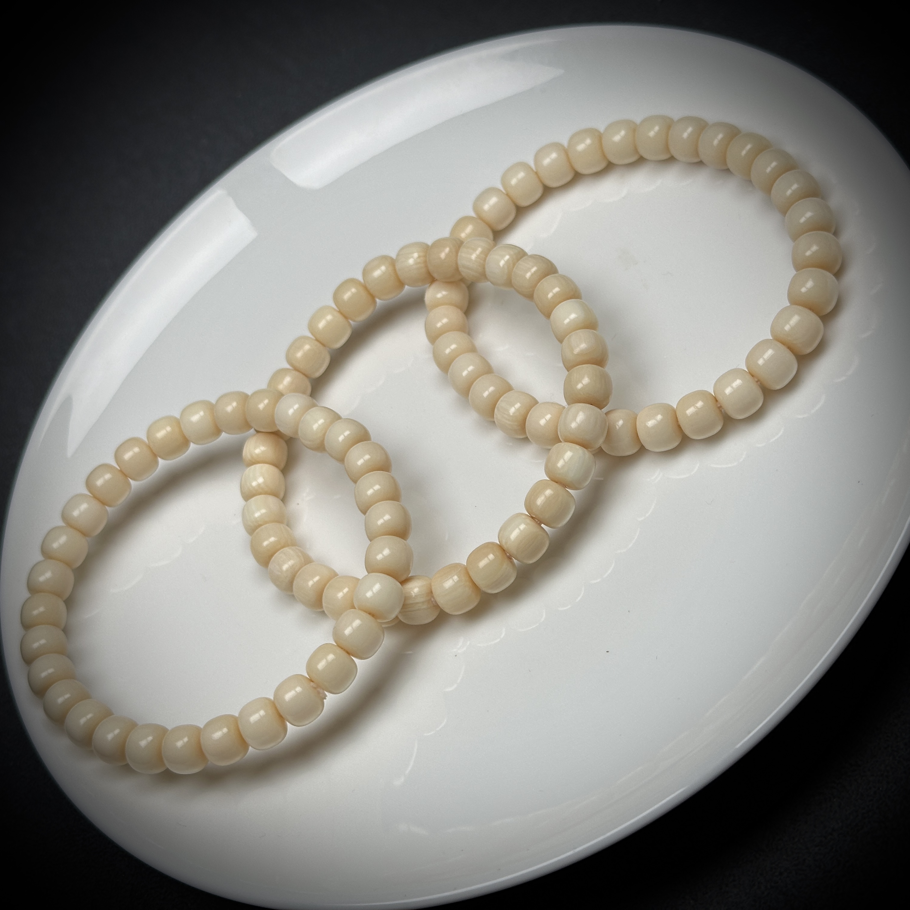 C004【7×6毕业】奶油白乳牙牙芯料猛犸牙手串7×6mm随机一条