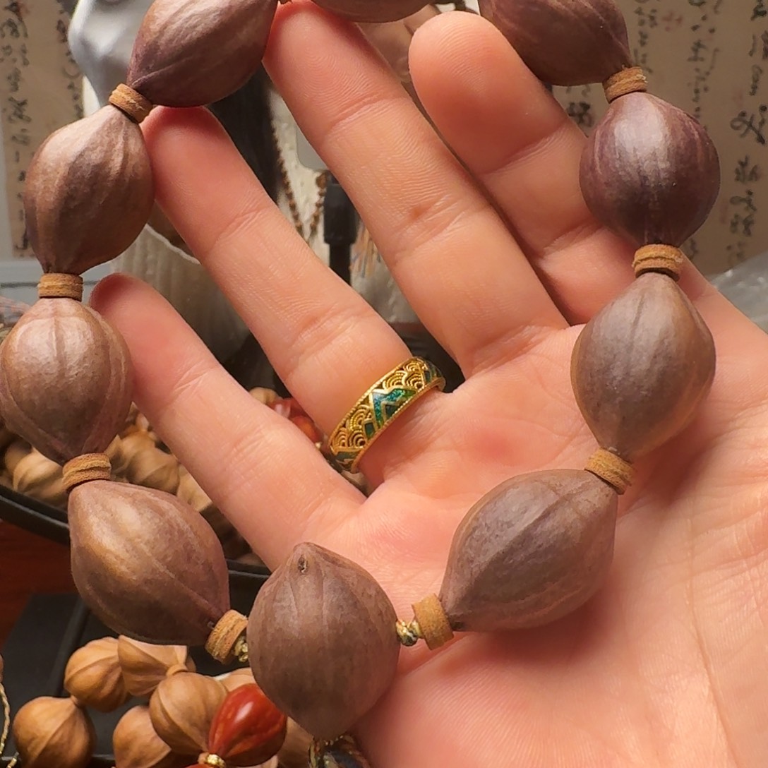 橄榄核把件紫皮核