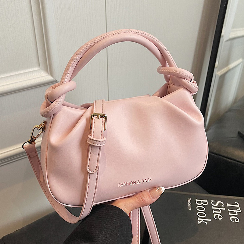 2025新款韩版简约时髦褶皱手提水桶包包小众设计百搭通勤斜挎包女