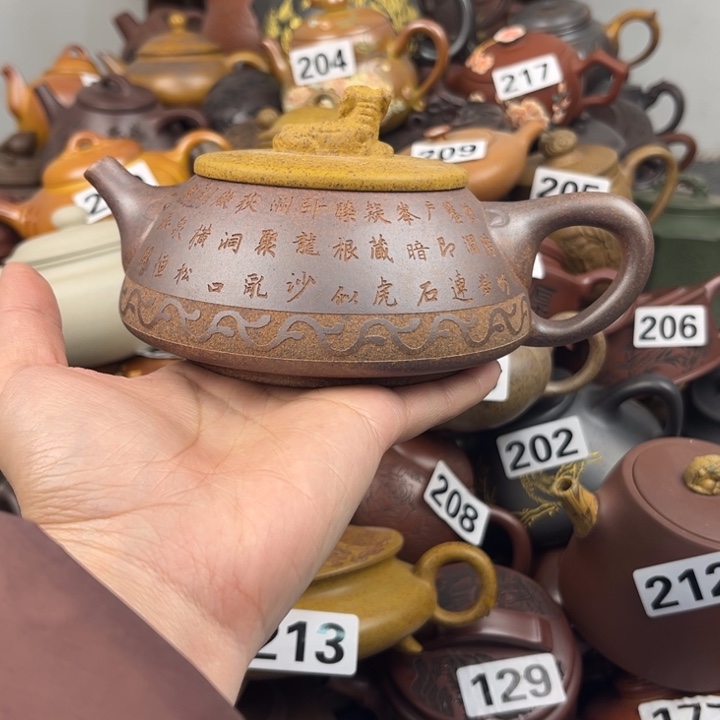 紫砂茶壶盖子不一样