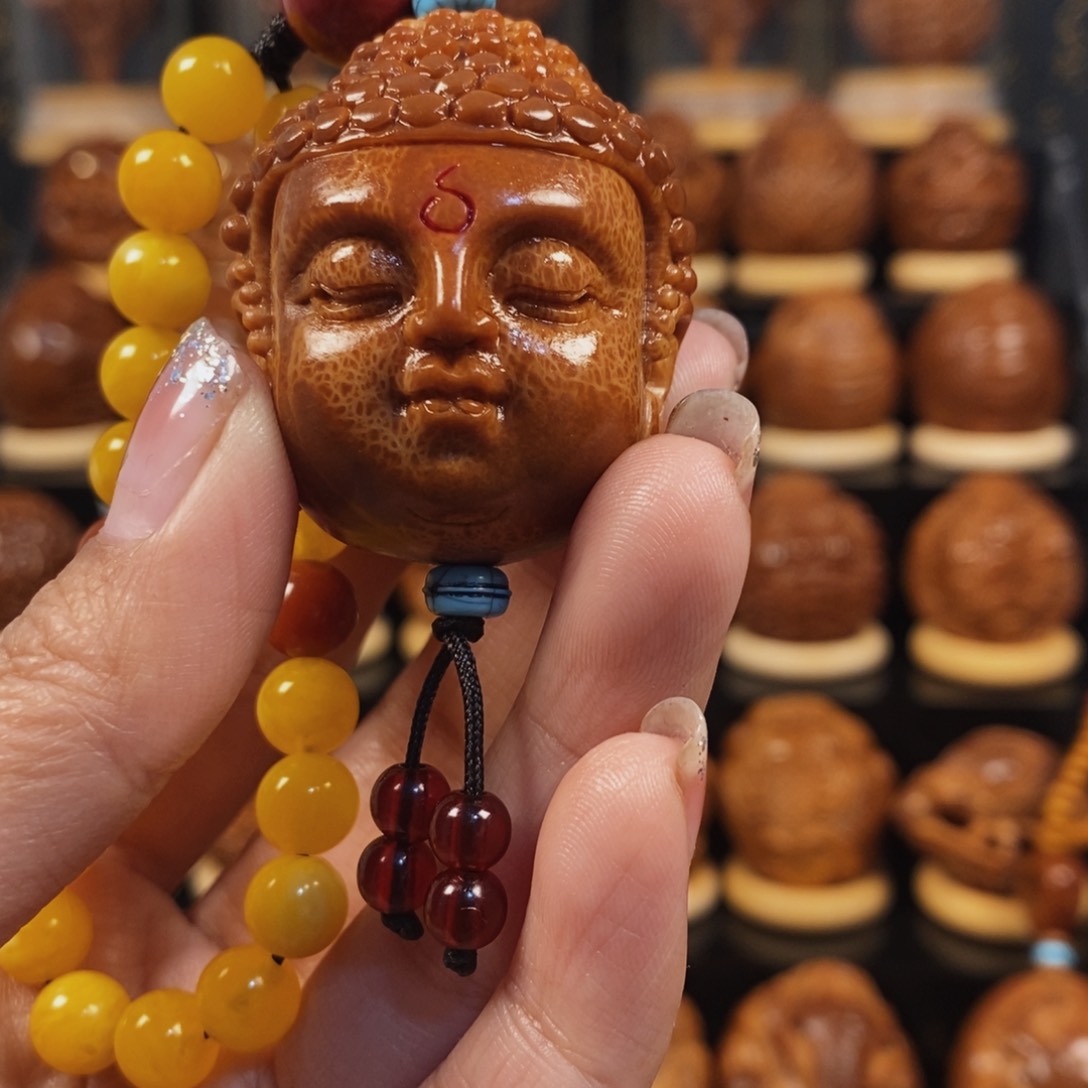 橄榄核吊坠佛头单颗001