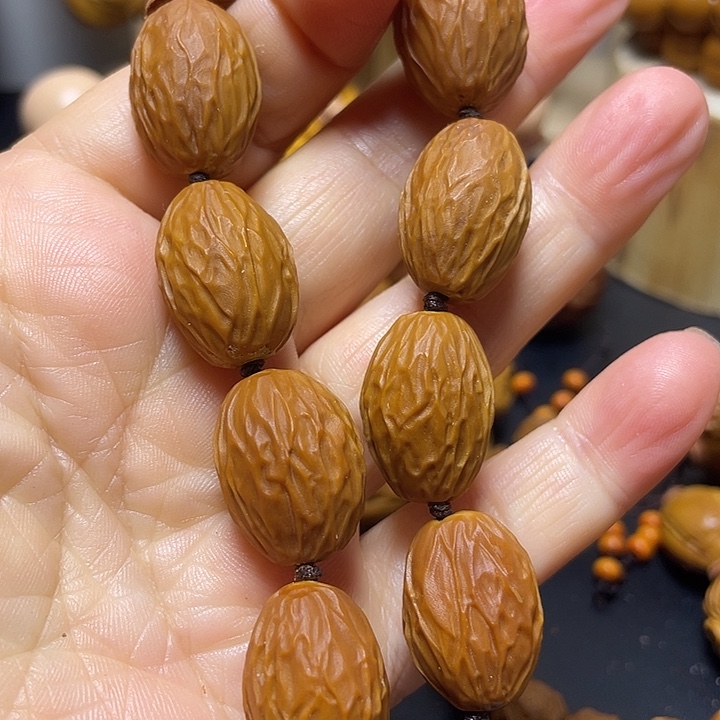 橄榄核手串qerrtyu