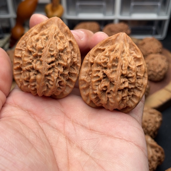 桃核把件野生鱼骨纹38头货