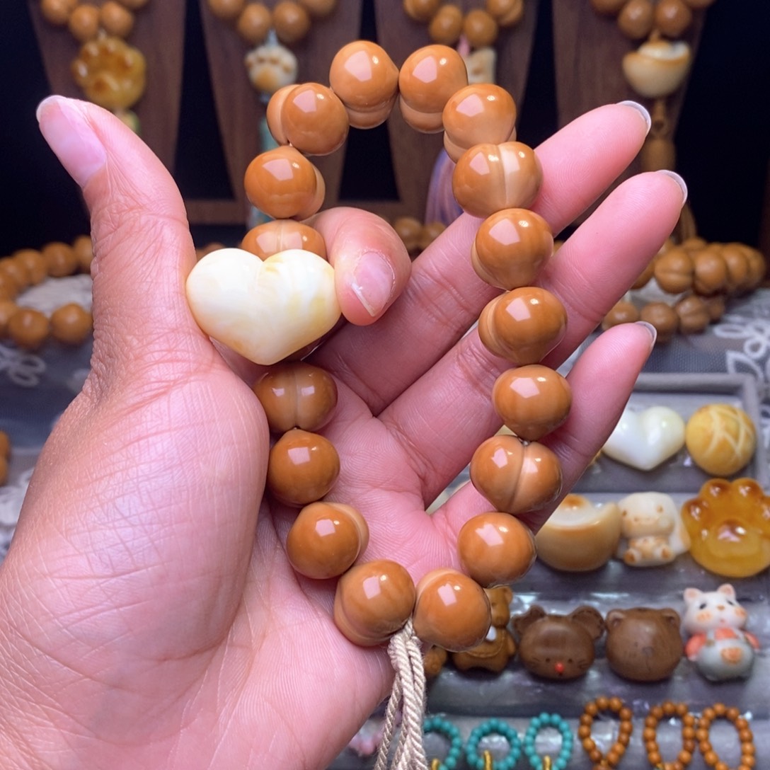 有***^猴头核桃吊坠屁桃手串